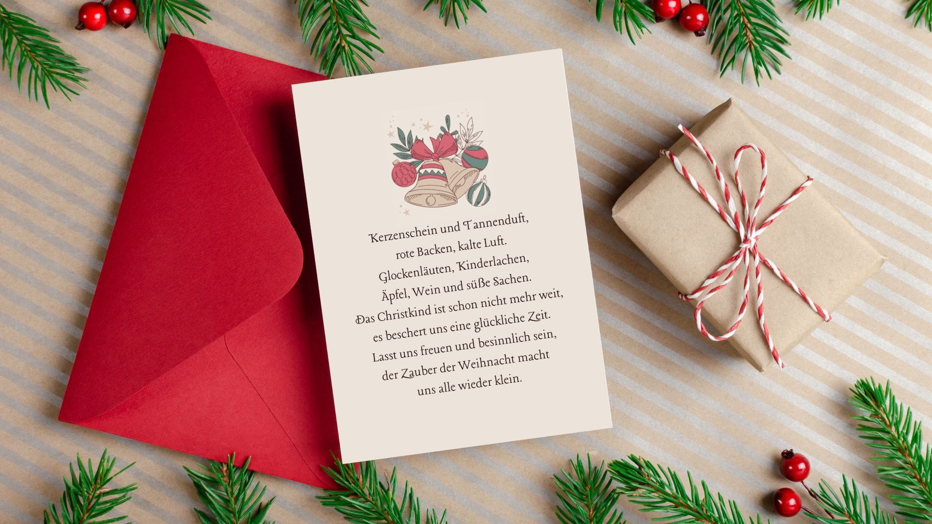 roter Umschlag und eine illustrierte Karte mit einem schönen Weihnachtsspruch
