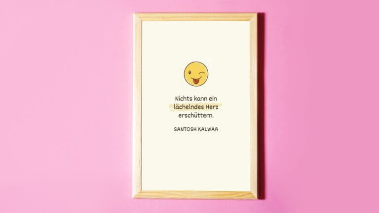 Spruch über das Lachen eingerahmt an der Wand